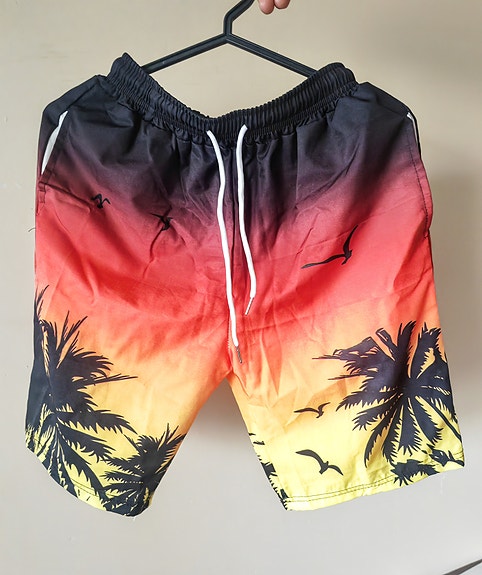 Miesten uimashortsit, oranssit/keltaiset/punaiset, koko S (/XS)