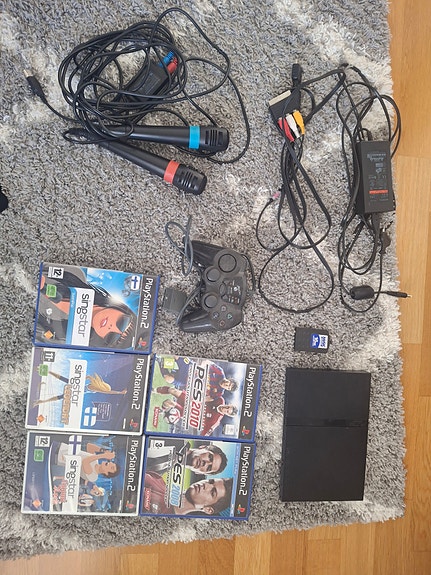 PlayStation 2 Slim pelikonsoli paketti