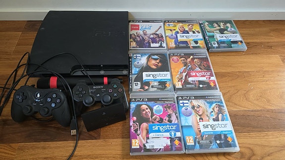 PS3 Singstar paketti (7kpl pelejä + langattomat mikit)