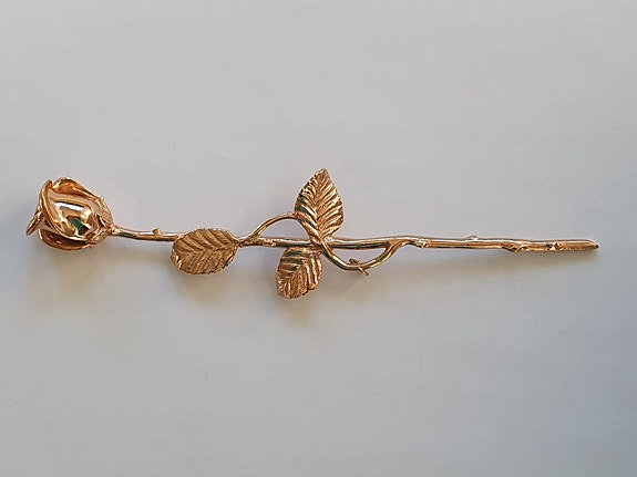 Kullanvärinen metalliruusu