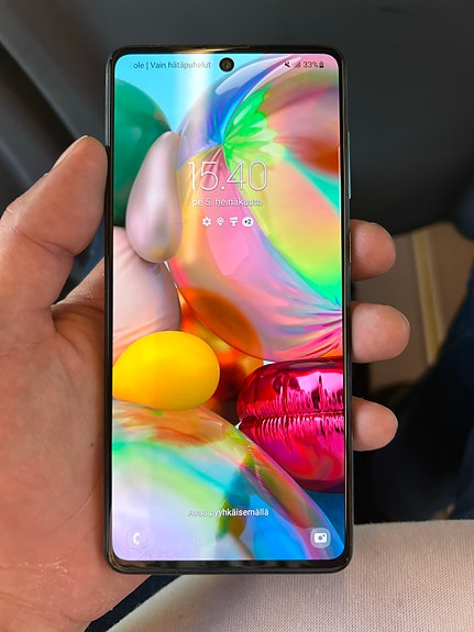 Samsung Galaxy A71-sarja älypuhelin vaalea kuin uusi käyttämätön varaapuhelin