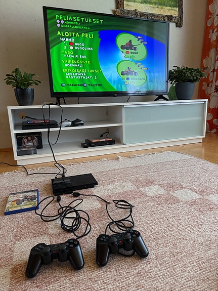 Sony PlayStation 2 Slim pelikonsoli