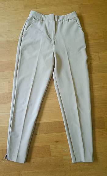 Vaaleanbeiget housut, koko 34