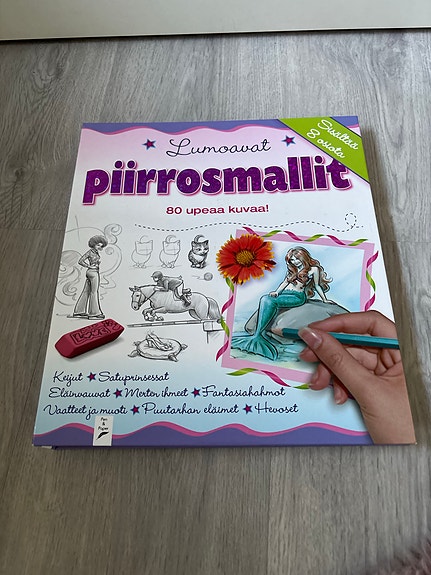 Lumoavat piirrosmallit kirja