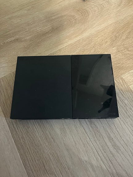 Sony PlayStation 2 Slim pelikonsoli musta
