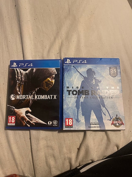 PlayStation 4 Mortal Kombat X ja Rise of the Tomb Raider pelit