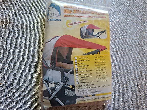 Aurinkokatos vaunuun tai rattaaseen