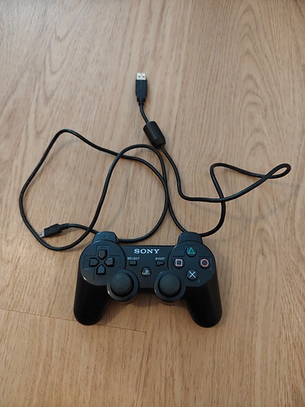 Playstation 3 Ohjain ja laturi