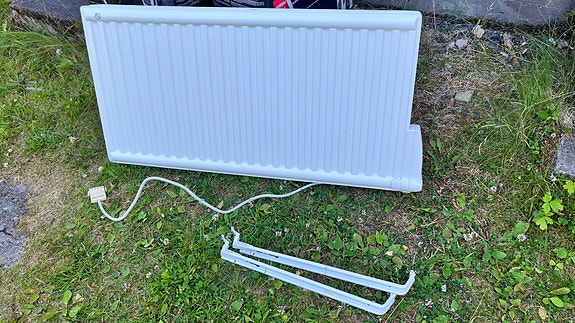 Öljytäytteinen kostean tilan patteri