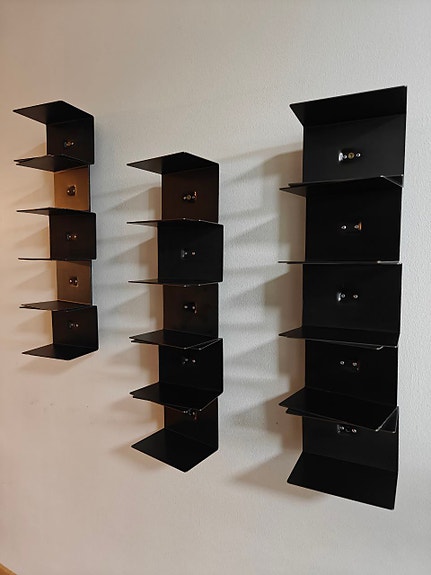 Opinion Ciatti, Ptolomeo musta design kirjahylly