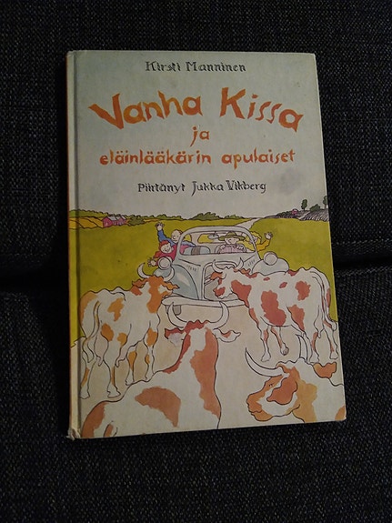 Vanha kissa ja eläinlääkärin apulaiset