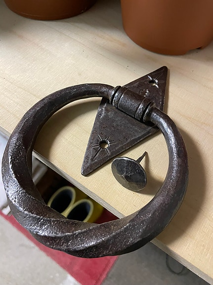 Taottu oven kolkutin