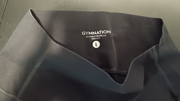 GYMNATION treenitrikoot L musta, taskuilla