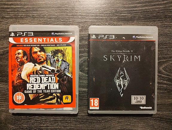 Red dead redemption ja Skyrim PS3 pelit