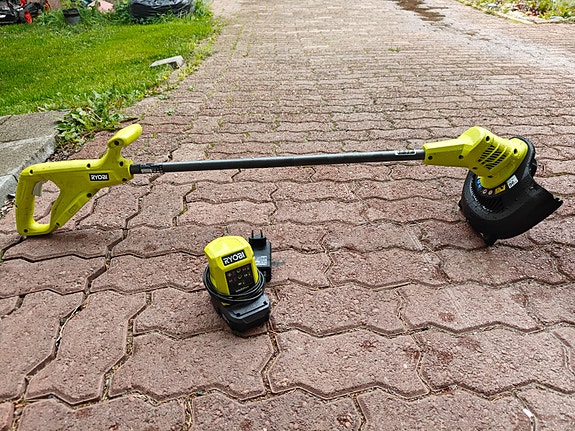 Ryobi akkutrimmeri + akku + laturi