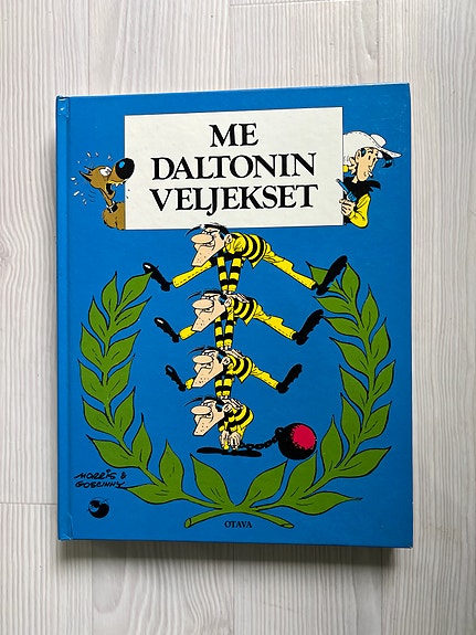Sarjakuvakokoelma Lucky Luke: Me Daltonin veljekset, kovakantinen kirja
