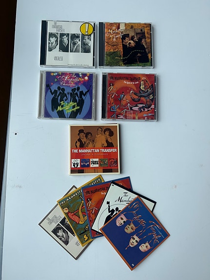 Manhattan Transfer CD-levyjä ja pahvikansia