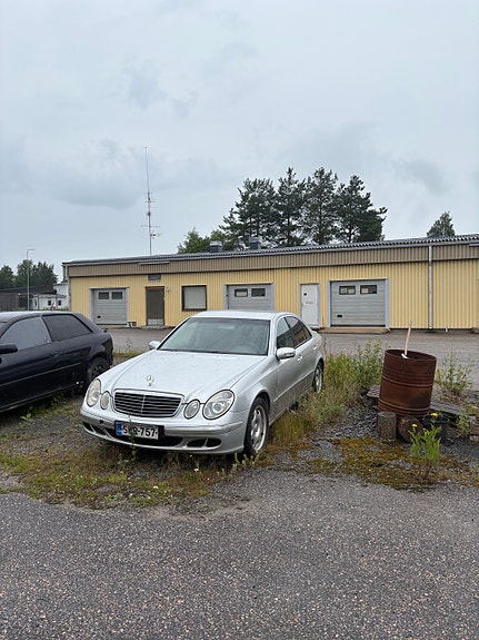 Mercedes-Benz w211 osina