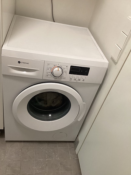 Ströme edestä täytettävä pesukone