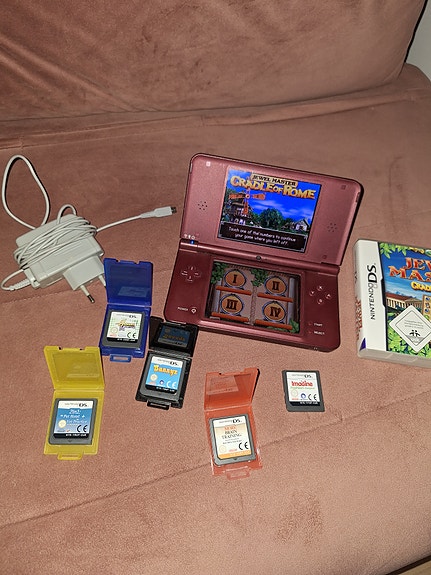 Nintendo DSi XL käsikonsoli punainen+pelejä