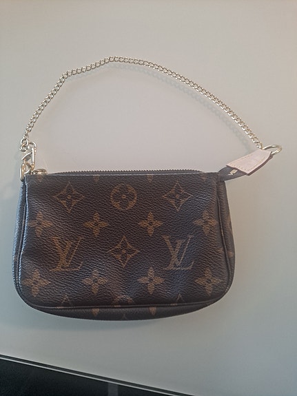 Louis Vuitton nahkainen monogrammi mini pochette / clutch naiset