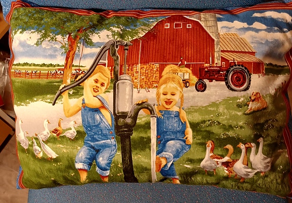 Koristetyyny maatila-aiheisella kuosilla