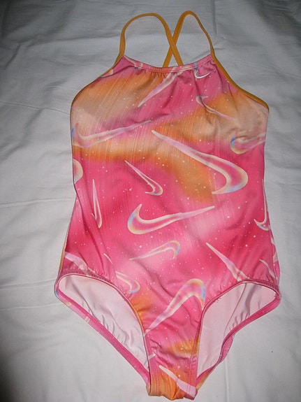 Nike lasten uimapuku koko 140 pinkki/oranssi