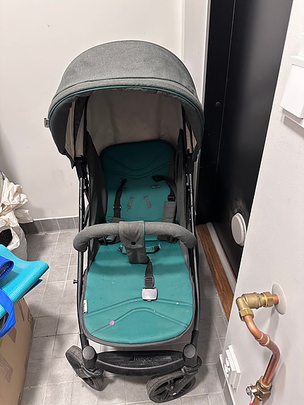 Stroller with car seat and carry coat