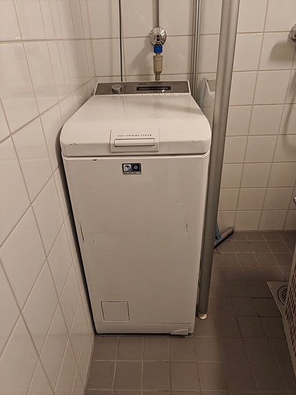 Päältätäytettävä pesukone