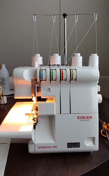 Singer 14U454B saumuri
