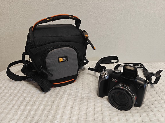 Canon PowerShot SX10 IS + Case Logic -kameralaukku