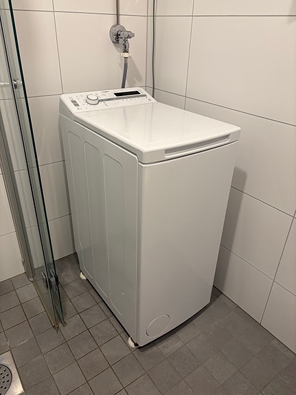 Päältä täytettävä pesukone