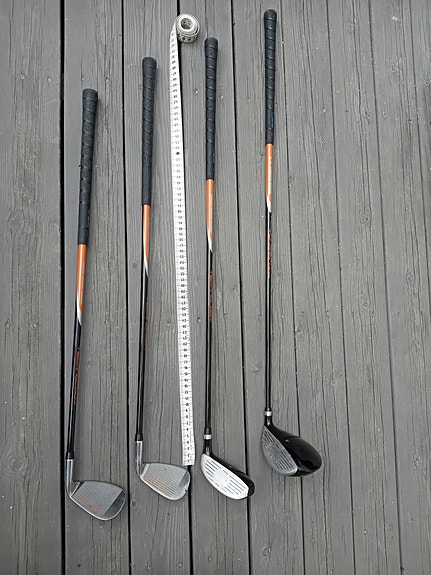 Lasten golfmailasetti bägin kanssa