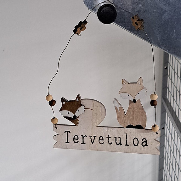 Tervetuloa kyltti