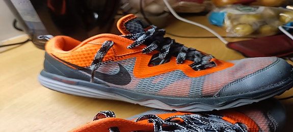 Nike Dual Fusion Trail tummanharmaa/oranssi miesten juoksukengät