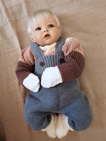 Posliini reborn nukke cuddlevartalolla