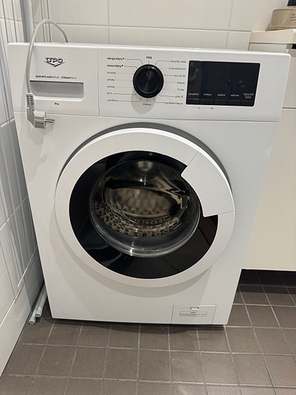 UPO edestä täytettävä pesukone valkoinen