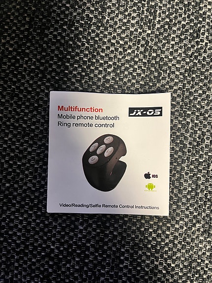 JX-05 bluetooth sormus-kaukosäädin puhelimelle