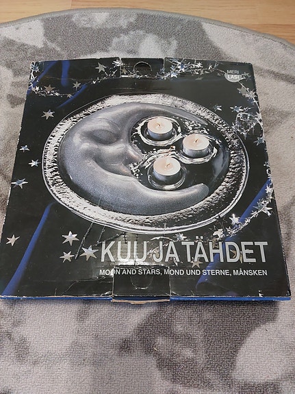 Meri lasi Kuu ja tähdet kynttiläalusta