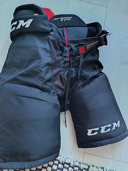 CCM FT475 jääkiekkohousut JR Small musta