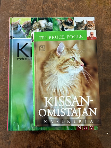 Kissanomistajan käsikirja ja Kissat -kirjat
