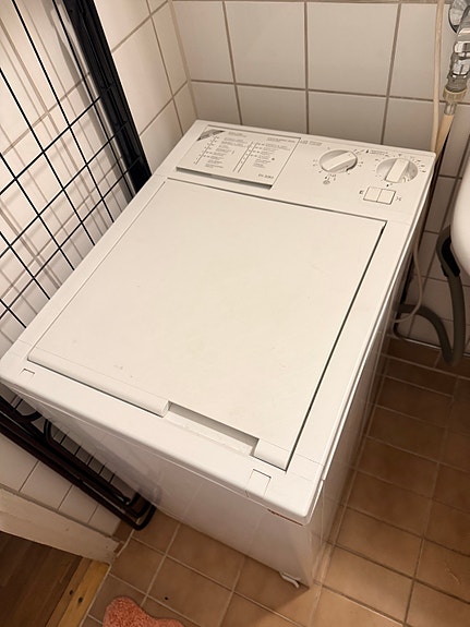 Päältätäytettävä pesukone