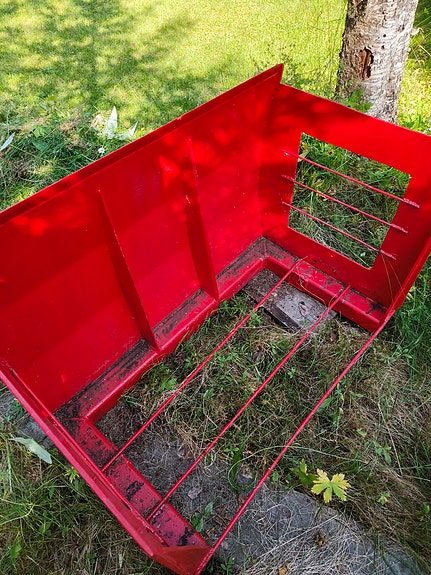 Traktorin perään.
