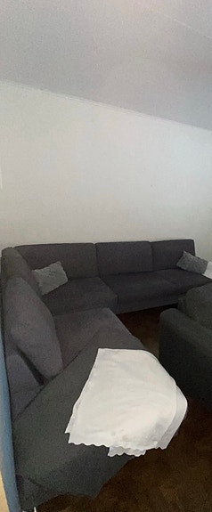 Harmaa kulmasohva