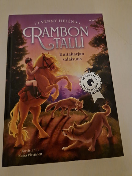 Rambon talli "Kultaharjan salaisuus" kirja