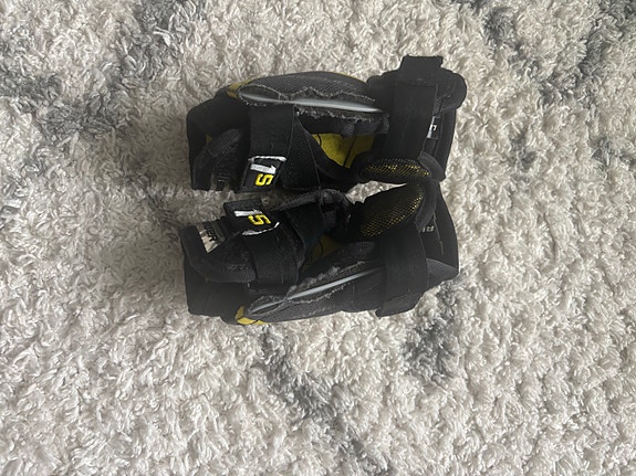 Bauer Supreme 1S jääkiekkokyynärsuojat koko Yth L/6 musta/keltainen