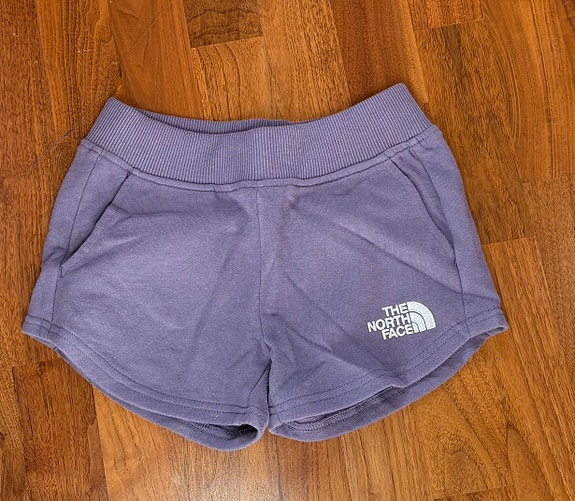 The North Face tyttöjen shortsit  M/140 cm violetti