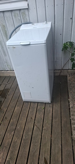 Päältätäytettävä pesukone