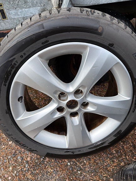 Opel astra j kesärenkaat vanteilla