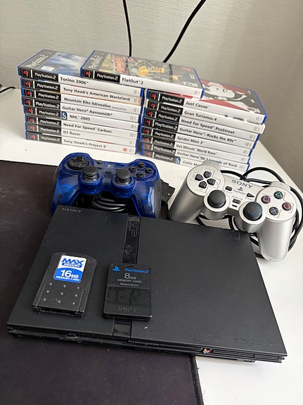 Sony PlayStation 2 konsoli + 2 ohjainta + 17 peliä